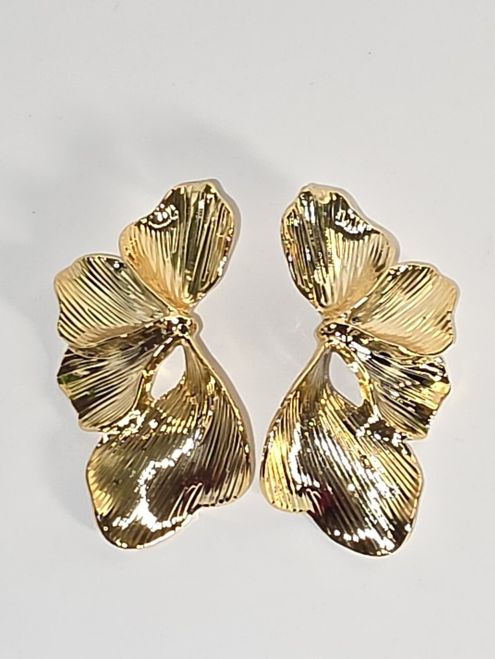 Gold flower drop earrings